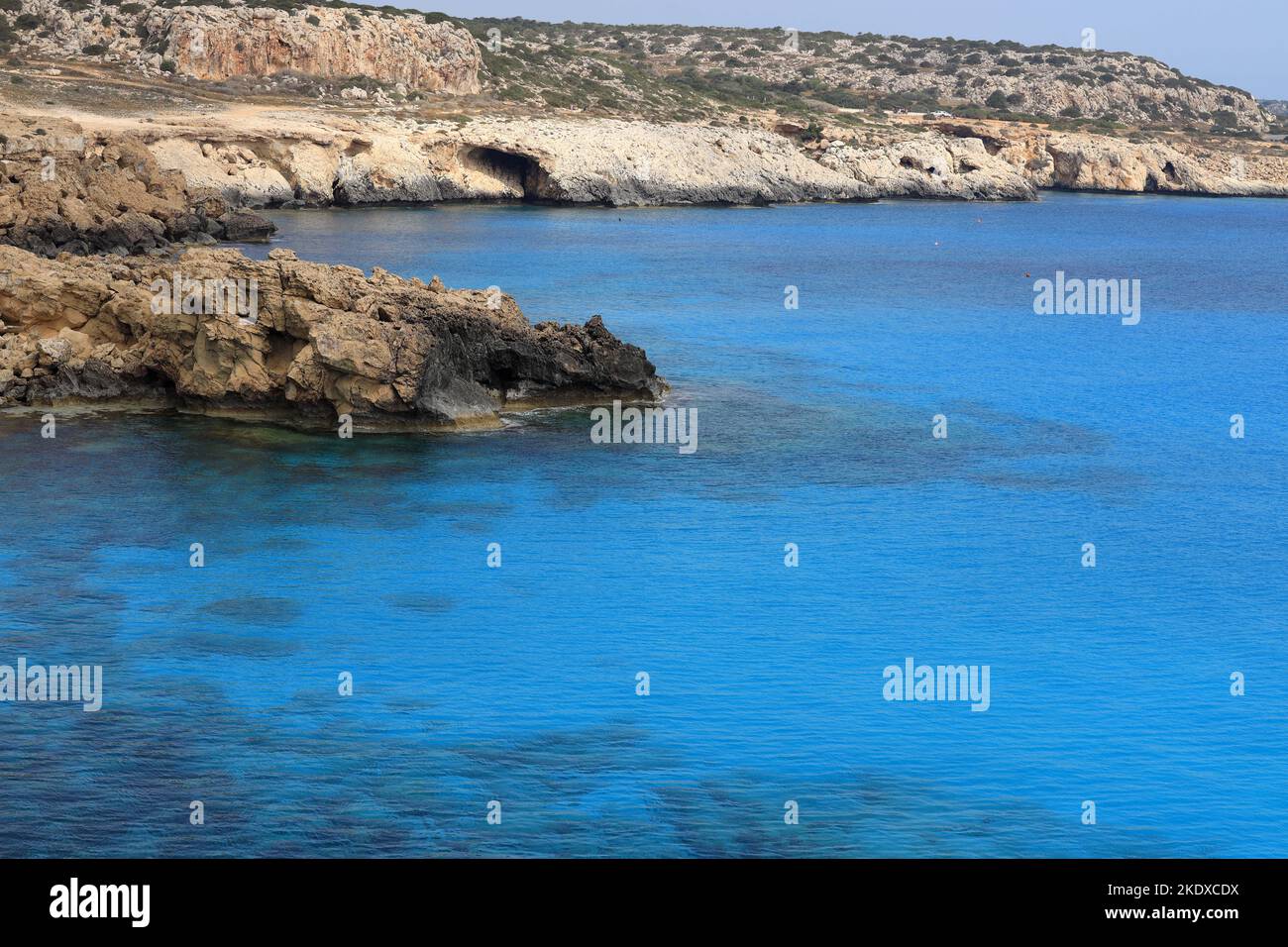 May 25, 2022, Larnaca, Cyprus: Deep blue Mediterranean Sea at Cape Greco National Forest Park at the southern end of Famagusta Bay and forms part of Ayia Napa Municipality. The Republic of Cyprus stands at a historic and cultural crossroads between Europe and Asia. Its chief cities-the capital of Nicosia, Limassol, Famagusta, and Paphos have absorbed the influences of generations of conquerors, pilgrims, and travelers and have an air that is both cosmopolitan and provincial. Today Cyprus is a popular tourist destination for visitors from Europe, favored by honeymooners (Credit Image: © Ruarid Stock Photo