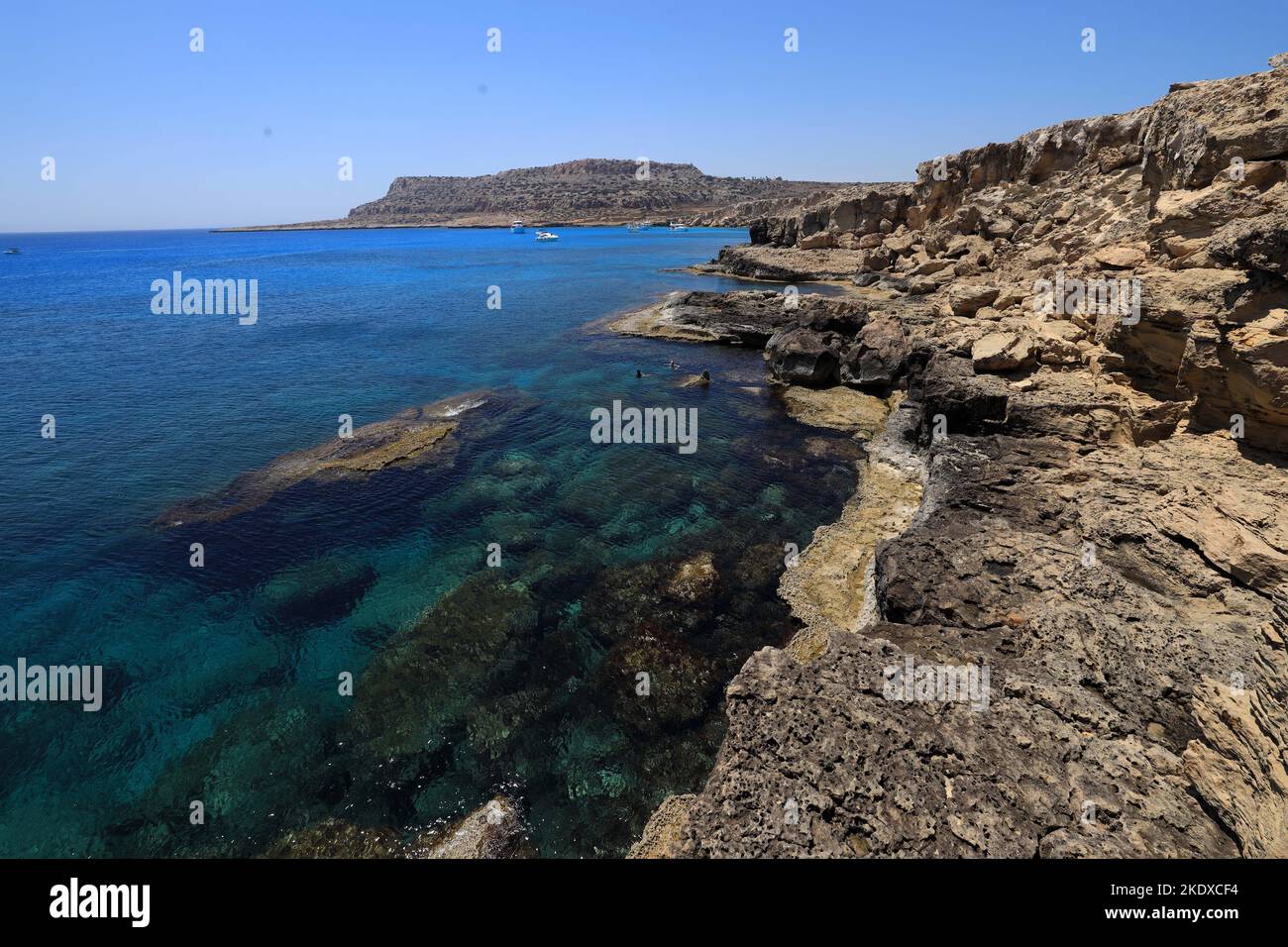 May 26, 2022, Larnaca, Cyprus: Deep blue Mediterranean Sea at Cape Greco National Forest Park at the southern end of Famagusta Bay and forms part of Ayia Napa Municipality. The Republic of Cyprus stands at a historic and cultural crossroads between Europe and Asia. Its chief cities-the capital of Nicosia, Limassol, Famagusta, and Paphos have absorbed the influences of generations of conquerors, pilgrims, and travelers and have an air that is both cosmopolitan and provincial. Today Cyprus is a popular tourist destination for visitors from Europe, favored by honeymooners (Credit Image: © Ruarid Stock Photo