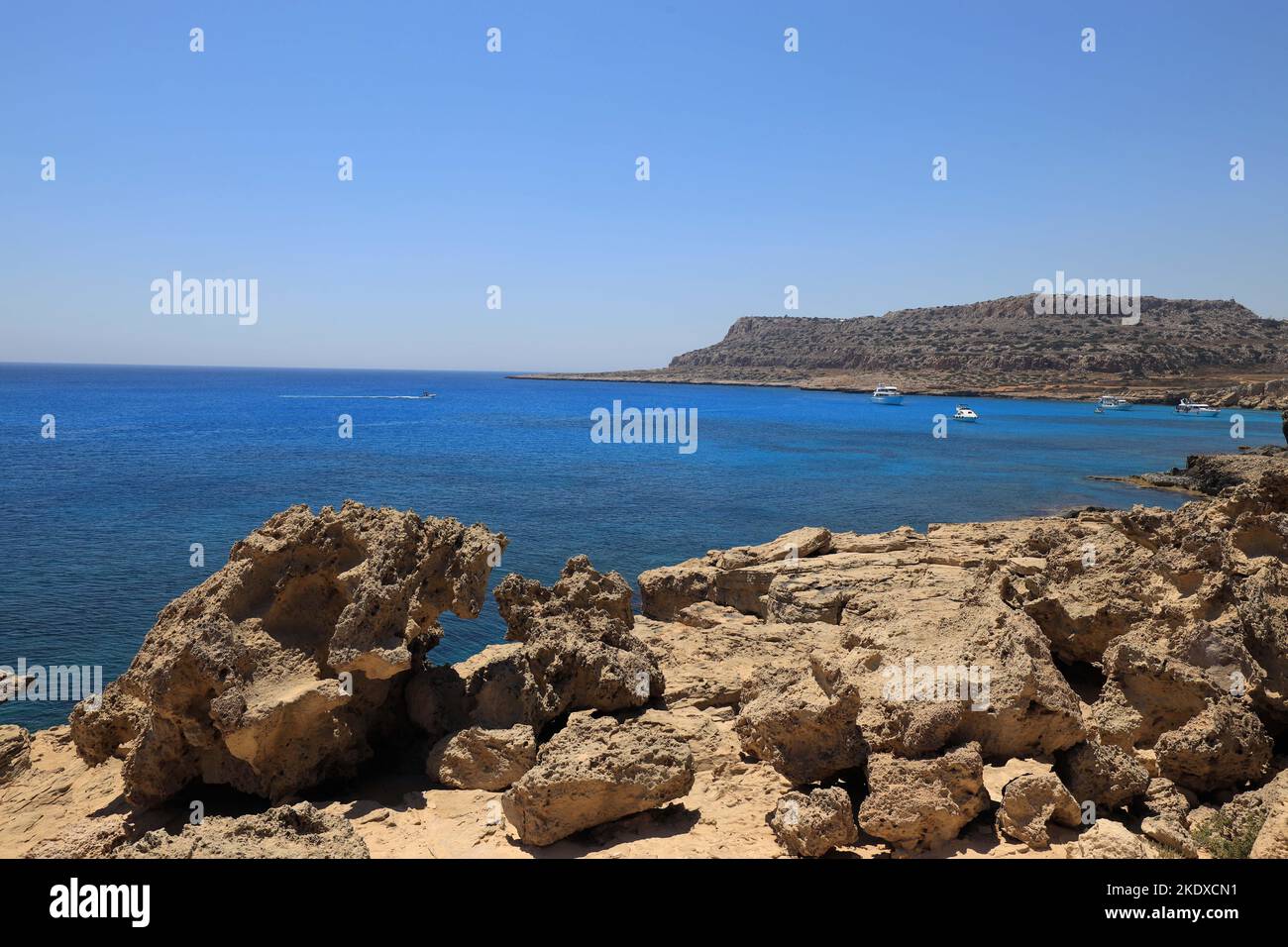 May 26, 2022, Larnaca, Cyprus: Deep blue Mediterranean Sea at Cape Greco National Forest Park at the southern end of Famagusta Bay and forms part of Ayia Napa Municipality. The Republic of Cyprus stands at a historic and cultural crossroads between Europe and Asia. Its chief cities-the capital of Nicosia, Limassol, Famagusta, and Paphos have absorbed the influences of generations of conquerors, pilgrims, and travelers and have an air that is both cosmopolitan and provincial. Today Cyprus is a popular tourist destination for visitors from Europe, favored by honeymooners (Credit Image: © Ruarid Stock Photo
