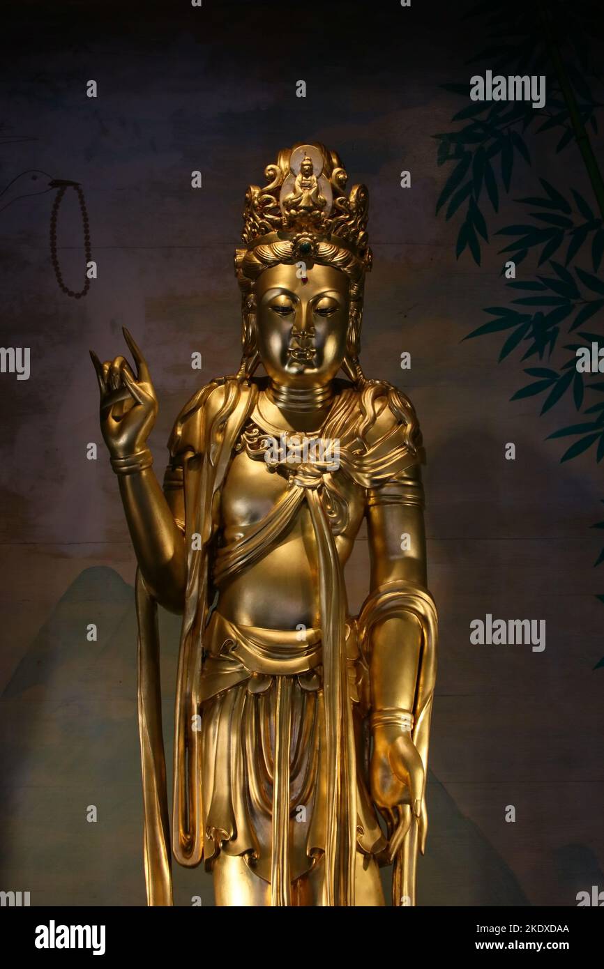 Song Dynasty art style Wood carving guanyin in thailand Stock Photo