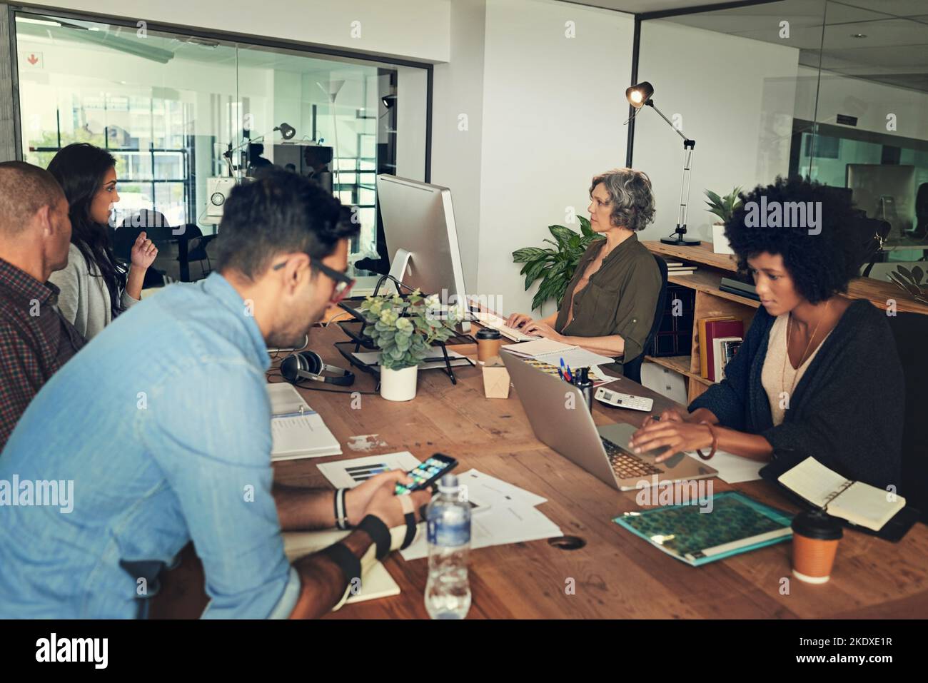 Theyre a team all committed to the job. a group of businesspeople ...