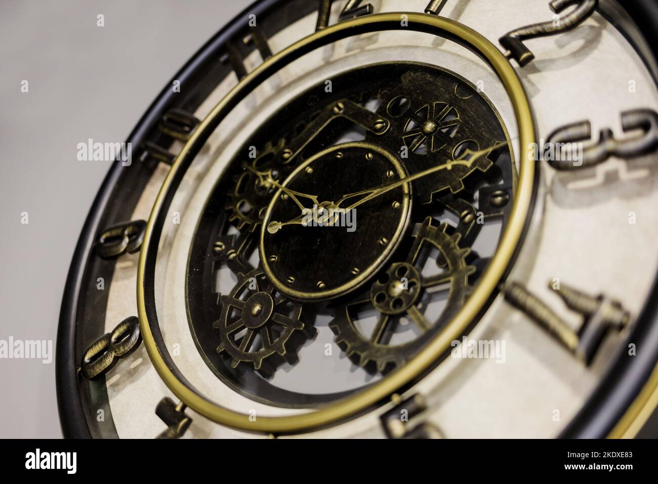 Old vintage clock hanging on wall. retro clock Stock Photo - Alamy