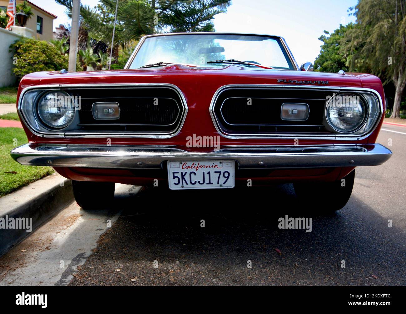 Classic red American car on a street in Coronado, California Stock Photo