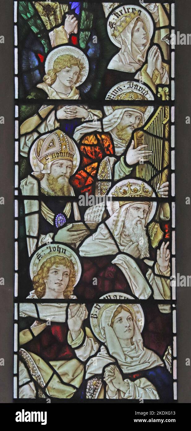 Stained glass window by Percy Bacon & Brothers depicting a host of saints, St Peter's Church, Caversham, Berkshire Stock Photo