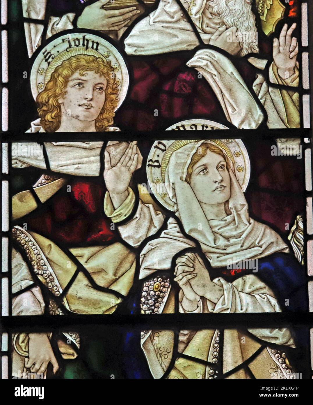 Stained glass window by Percy Bacon & Brothers depicting The Blessed Virgin Mary and St John, St Peter's Church, Caversham, Berkshire Stock Photo