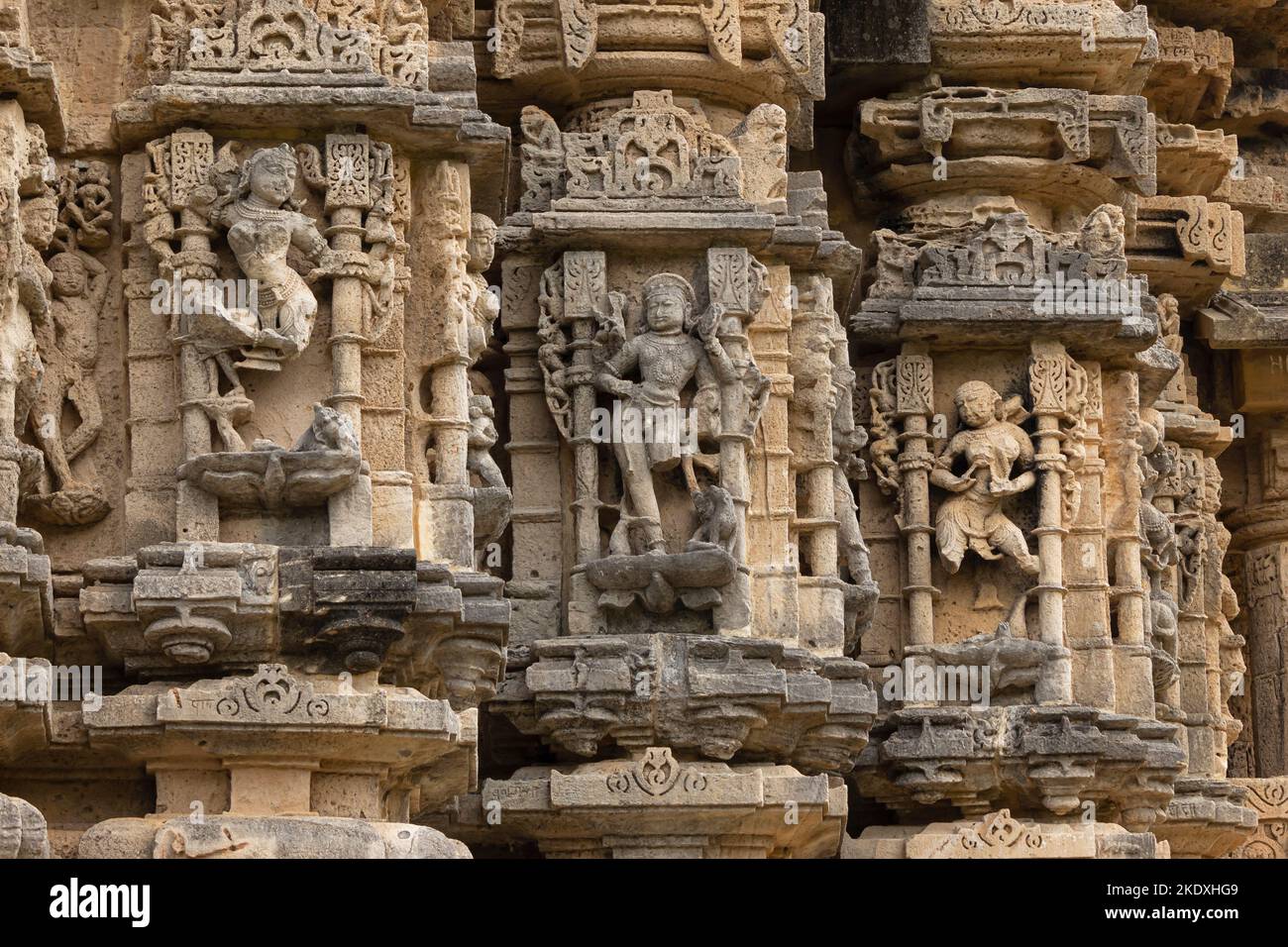 Sculptures of Hindu God and Goddess on Navlakha Temple, Ghumli, Dwarka, Gujarat, India. Stock Photo