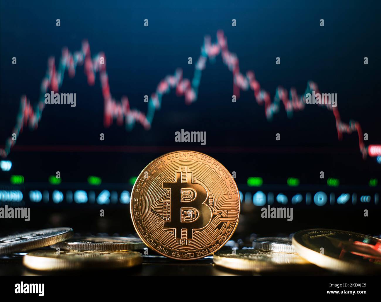 Bitcoin and cryptocurrency investing concept. Bitcoin cryptocurrency coins. Trends in bitcoin exchange rates. Graph review of Annual Report Rise and f Stock Photo