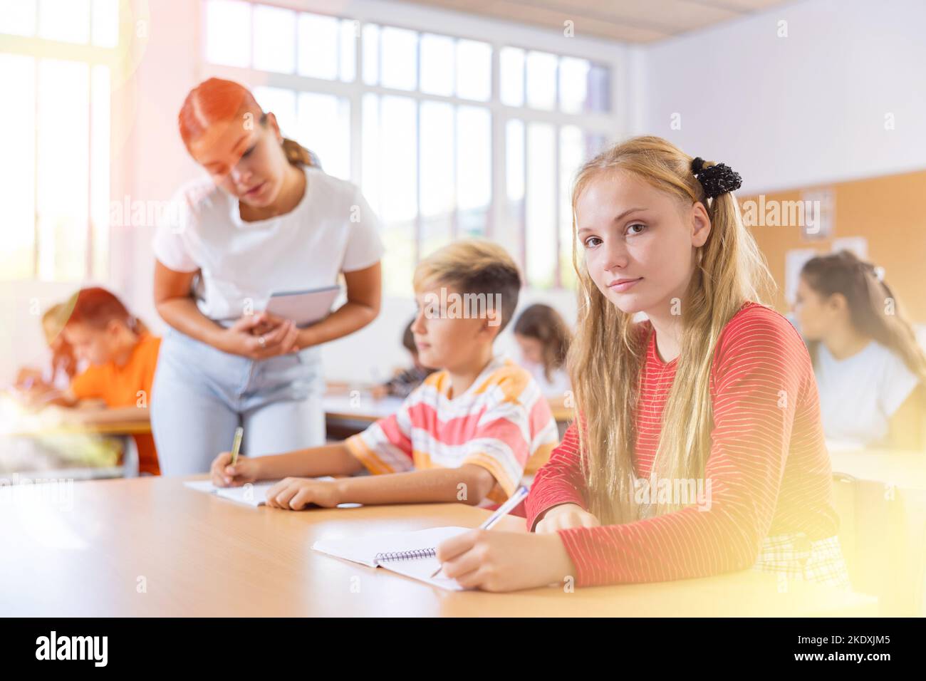 Portrait of girl in classroom Stock Photo - Alamy