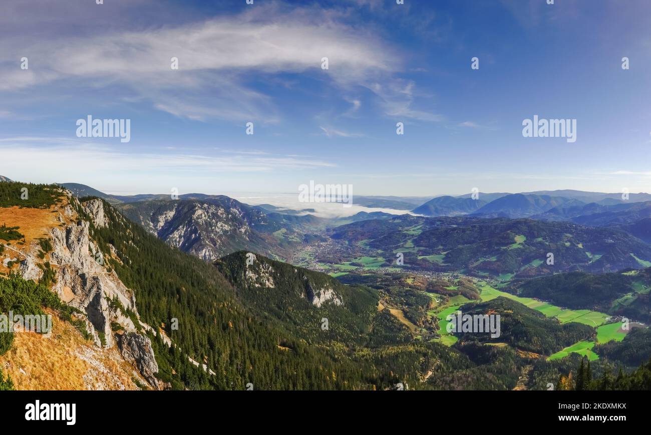 wonderful wide view to other mountains and dense fog in the valley panorama view Stock Photo