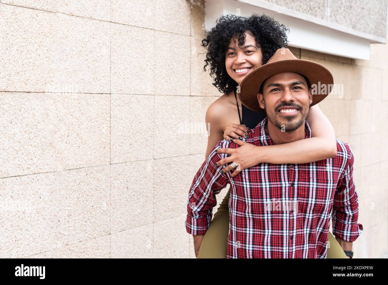 Beautiful Young Girl Giving Piggyback Ride To Stock Photo - Image of  beauty, good: 43889816