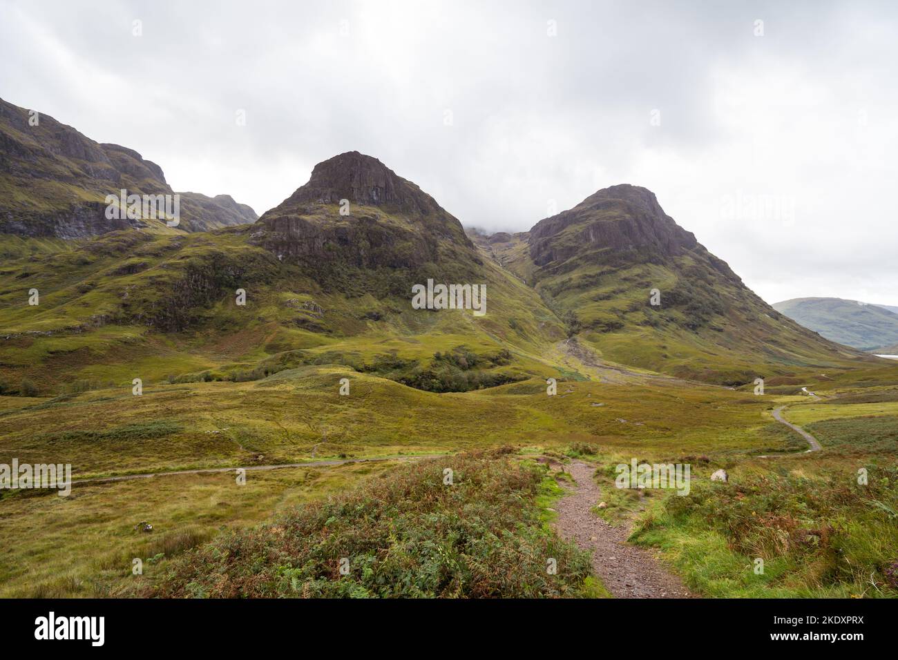 Breathtaking view of path going towards mountain range located against ...