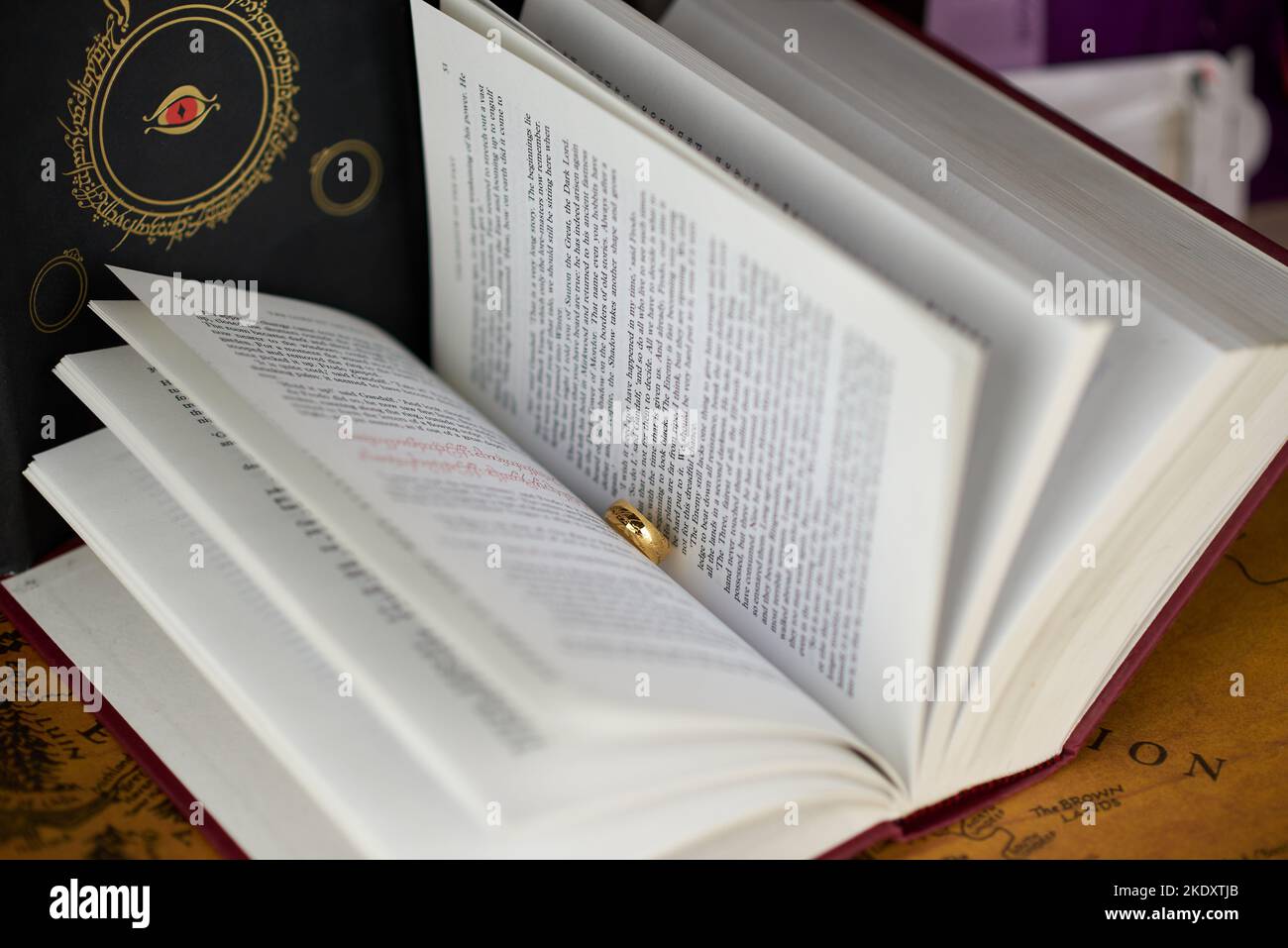 Astrakhan, Russia - 11.09.2022: Golden Ring of Power lies between the pages of the The Lord of the Rings book Stock Photo