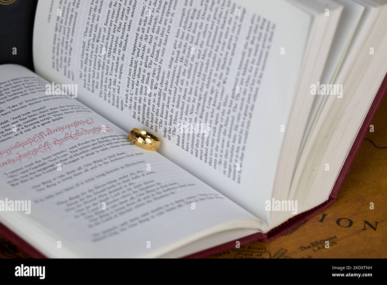 Astrakhan, Russia - 11.09.2022: Golden Ring of Power lies between the pages of the The Lord of the Rings book Stock Photo