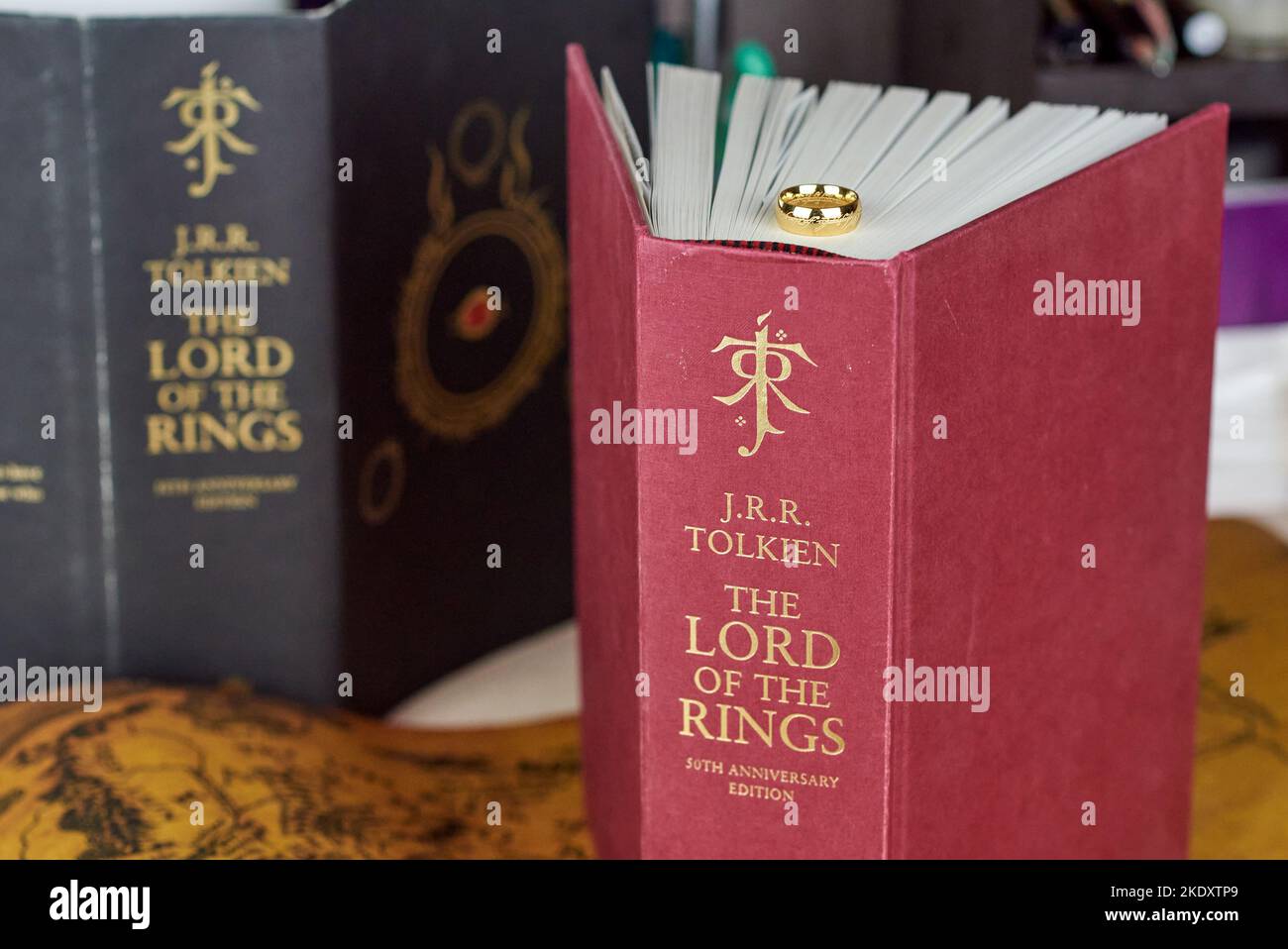 Astrakhan, Russia - 11.09.2022: Golden Ring of Power lies on the red thick The Lord of the Rings book Stock Photo