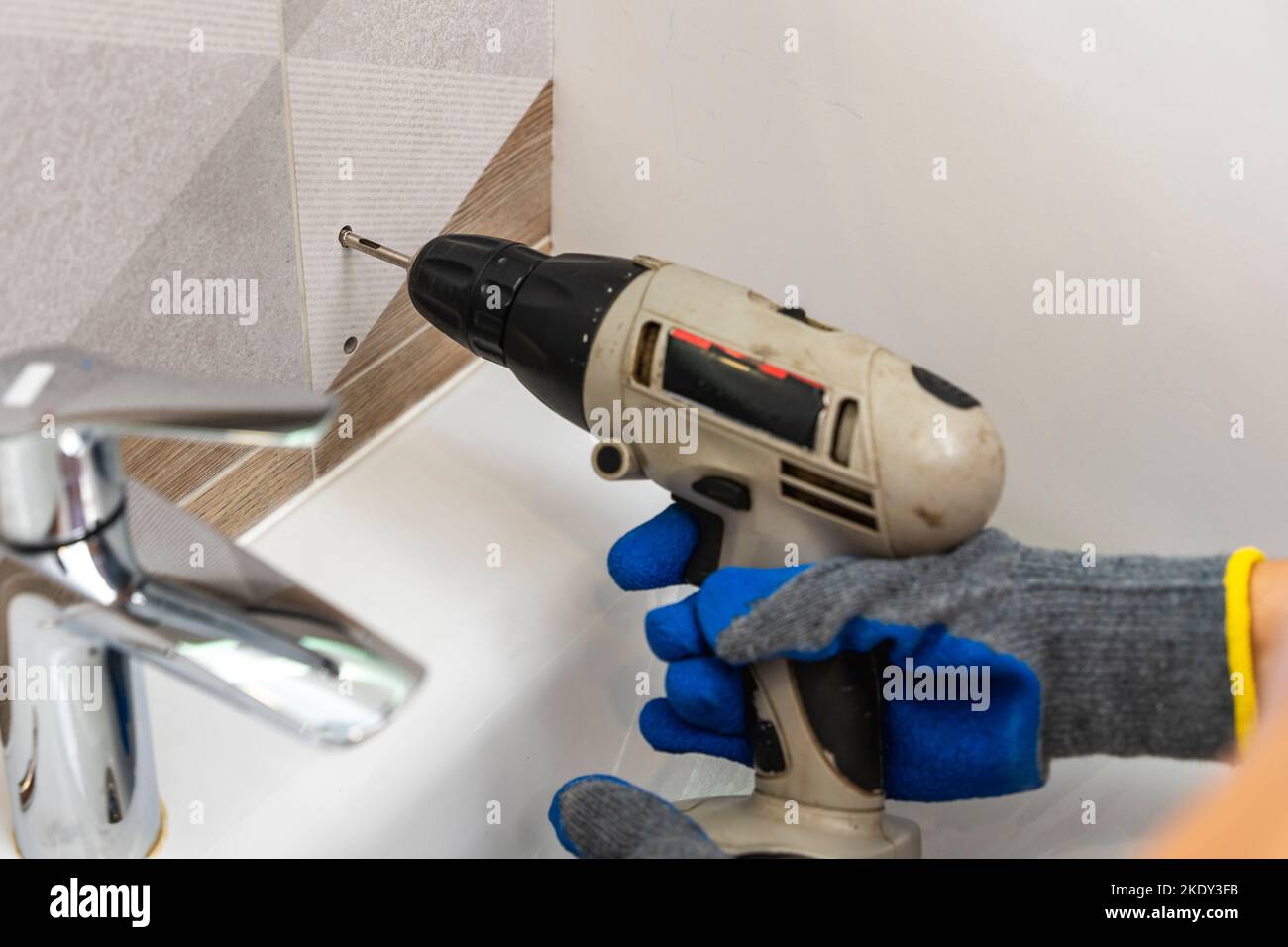 drilling holes in porcelain stoneware, drilling holes in tiles Stock