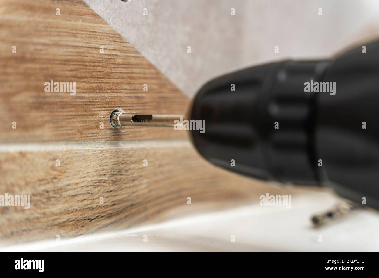 drilling holes in porcelain stoneware, drilling holes in tiles Stock