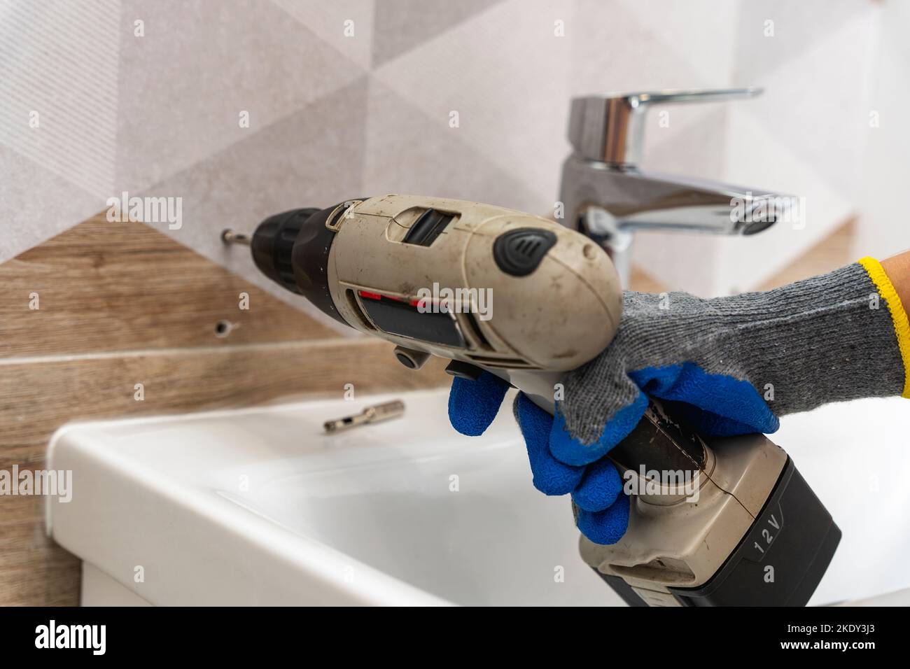 drilling holes in porcelain stoneware, drilling holes in tiles Stock
