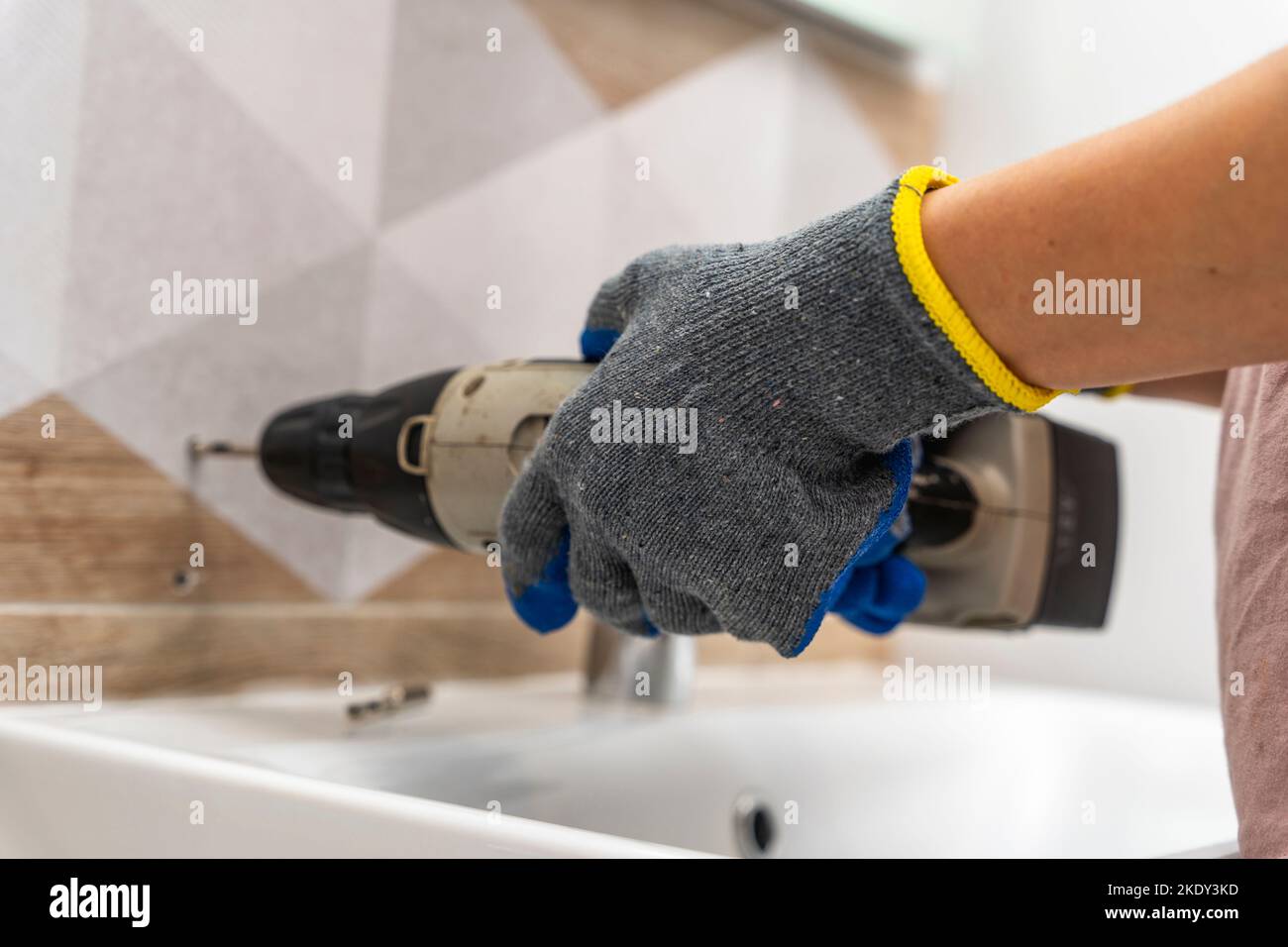 drilling holes in porcelain stoneware, drilling holes in tiles Stock