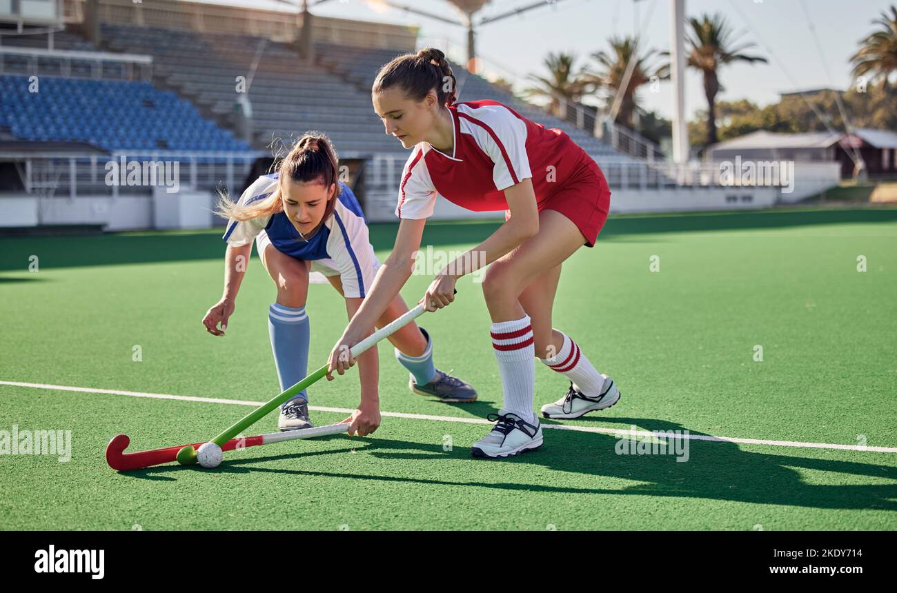 Sports fitness, field hockey game and women challenge for ball in