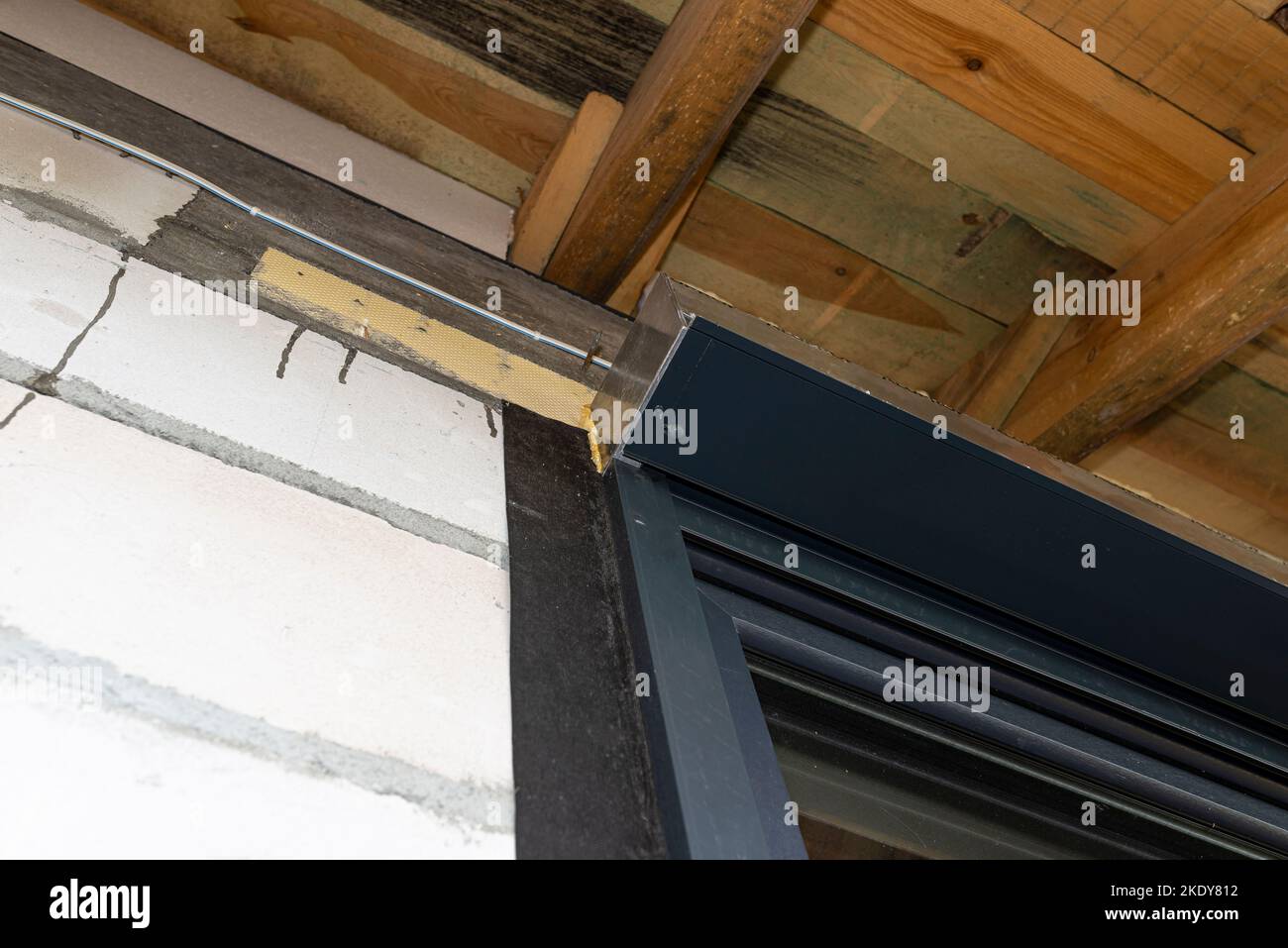 Warm installation of a three-layer window with a polystyrene window ...