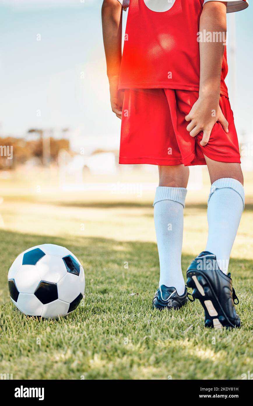 Fitness, soccer kid or hamstring pain on soccer field for workout