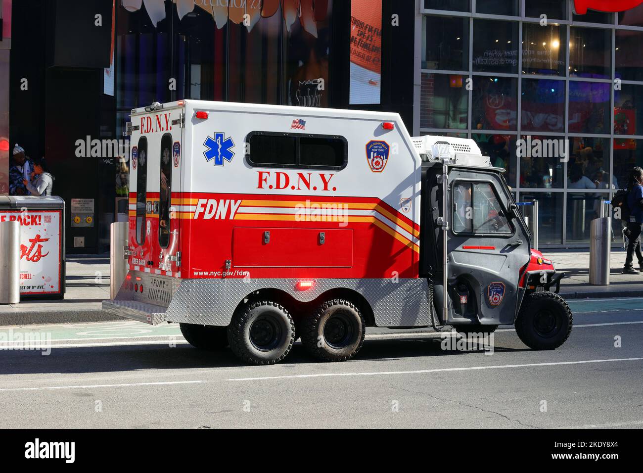 A FDNY EMS ASAP mini ambulance in Times Square, New York. The custom built Polaris 6x6 UTV is designed to manoever through Times Square traffic. Stock Photo
