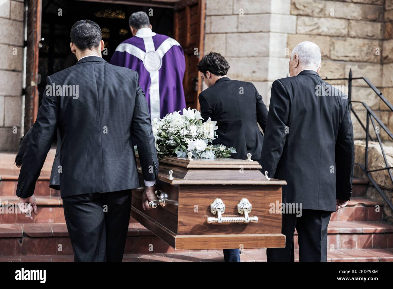 Death, funeral and holding coffin in church for grief, bereavement and