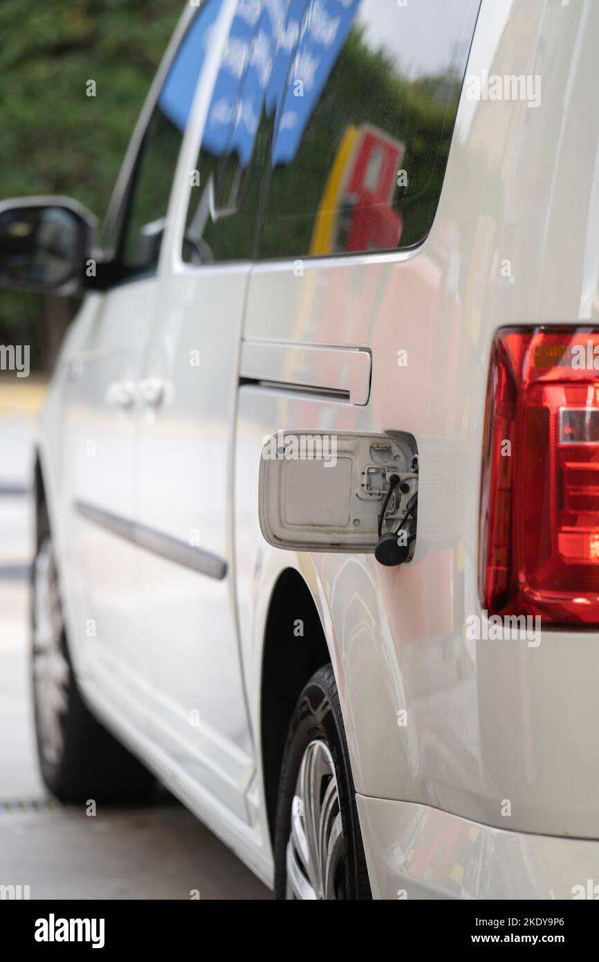 Vehicle with gas cap opened ready to refuel with gas or petrol at a gas station Stock Photo Alamy
