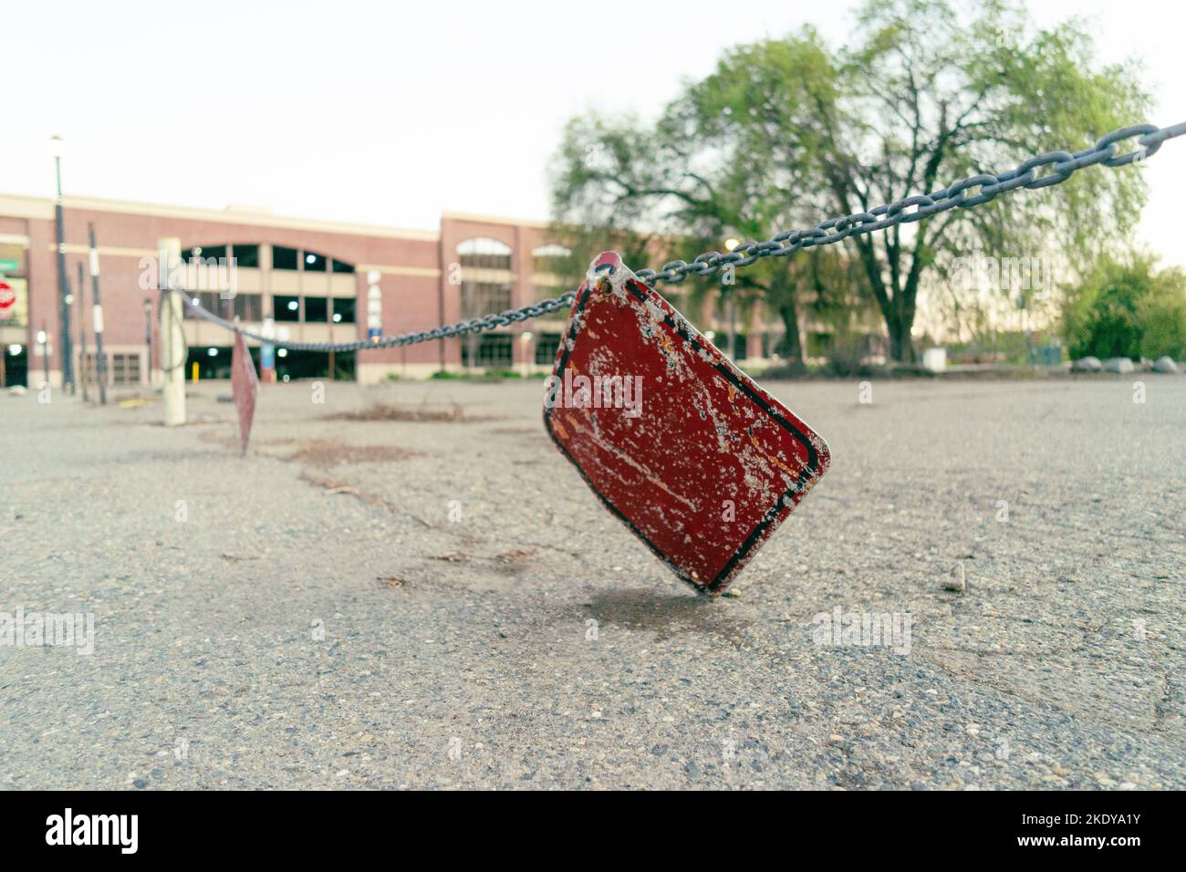 A parking lot chain with a red signage in Folsom, California Stock