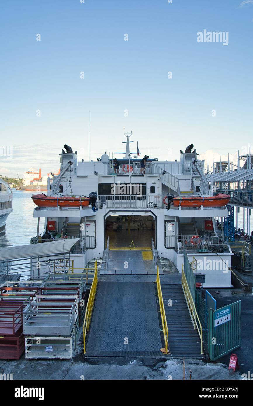A vertical of a ferry getting ready to start its operation at a harbor ...