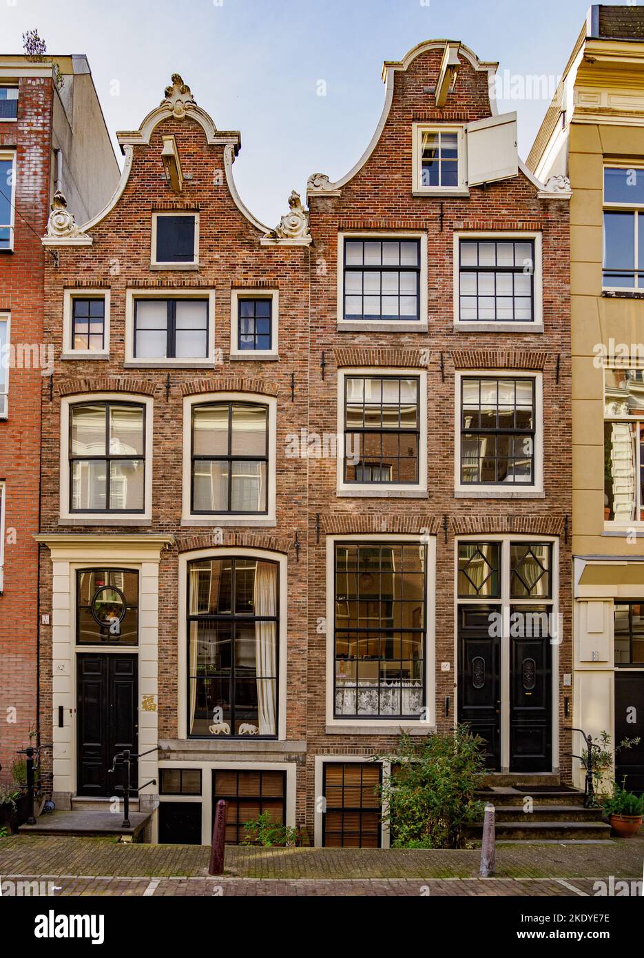 Elegant gabled houses in a street in Amsterdam Holland Netherlands Stock Photo