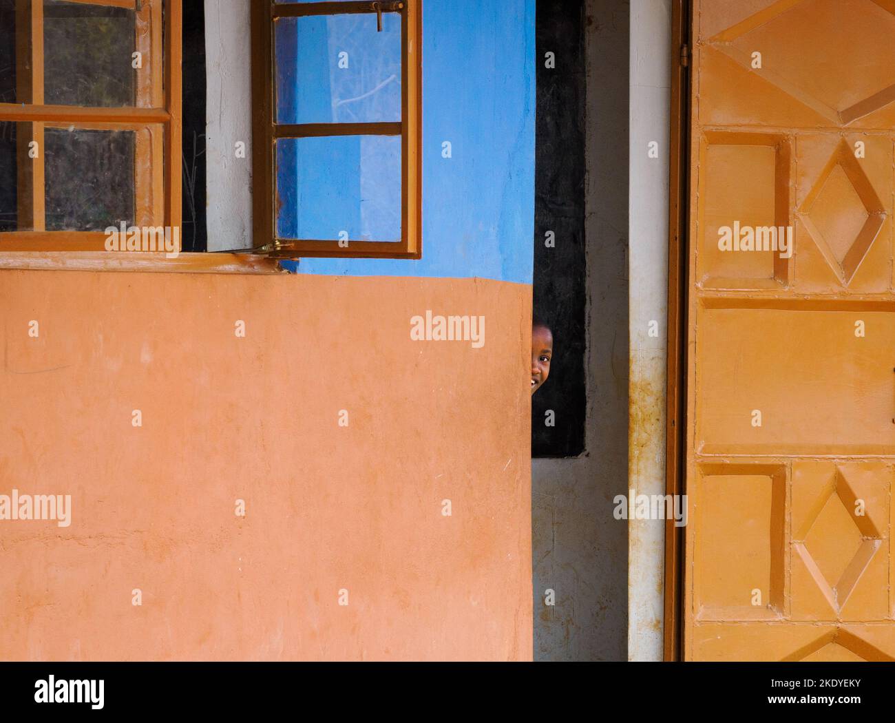 Happy smiling children at the classroom door of a school in the Sagalla region of Kenya near Voi East Africa Stock Photo
