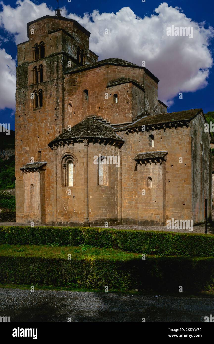 Medieval former royal nunnery church of Santa Maria at Santa Cruz de la Serós in Huesca, Aragon, Spain.  Round-arched Romanesque windows are filled with ultra-thin sheets of translucent alabaster - a traditional material pre-dating the widespread use of glass.  The church, first mentioned in the year 1070, was built for a Benedictine nunnery, founded by the royal House of Aragon as a ‘family monastery’.  Some female members of the royal family ruled the nunnery as abbesses, while others patronised it, including daughters of the first King of Aragon, Ramero I (1007-1063). Stock Photo