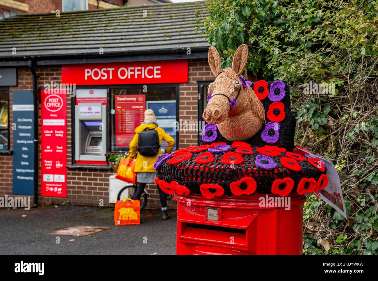 Whalley, Clitheroe, Lancashire, UK. 9th Nov, 2022.   A post box cover at Whalley, Clitheroe, Lancashire provided by the local Knit and Natter group remembering the horses which died in the Great War.  Credit: John Eveson/Alamy Live News Stock Photo