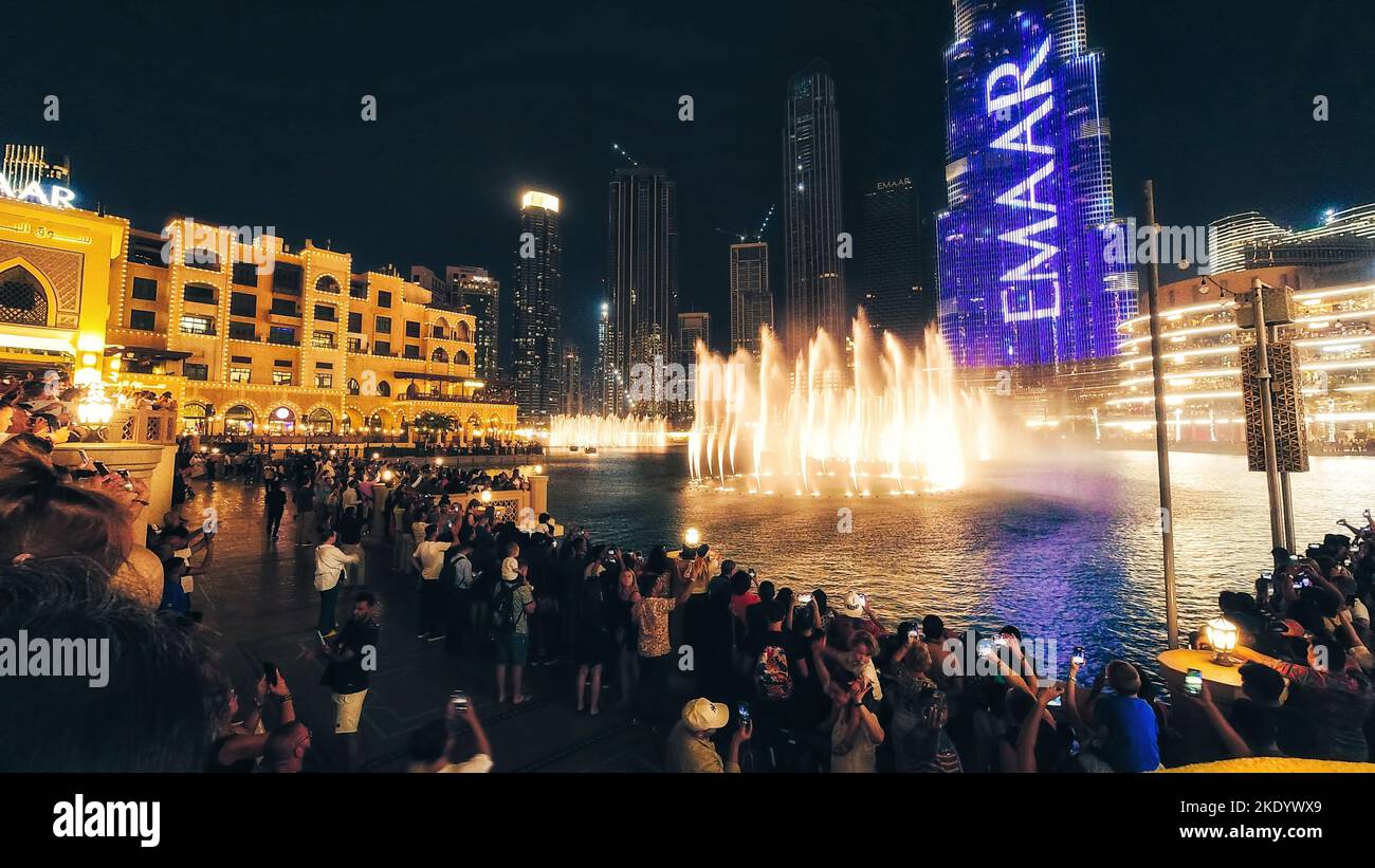 Dubai, United arab emirates - 10th october, 2022: tourist watch record The Dubai Fountain is the world's largest choreographed fountain system set on Stock Photo