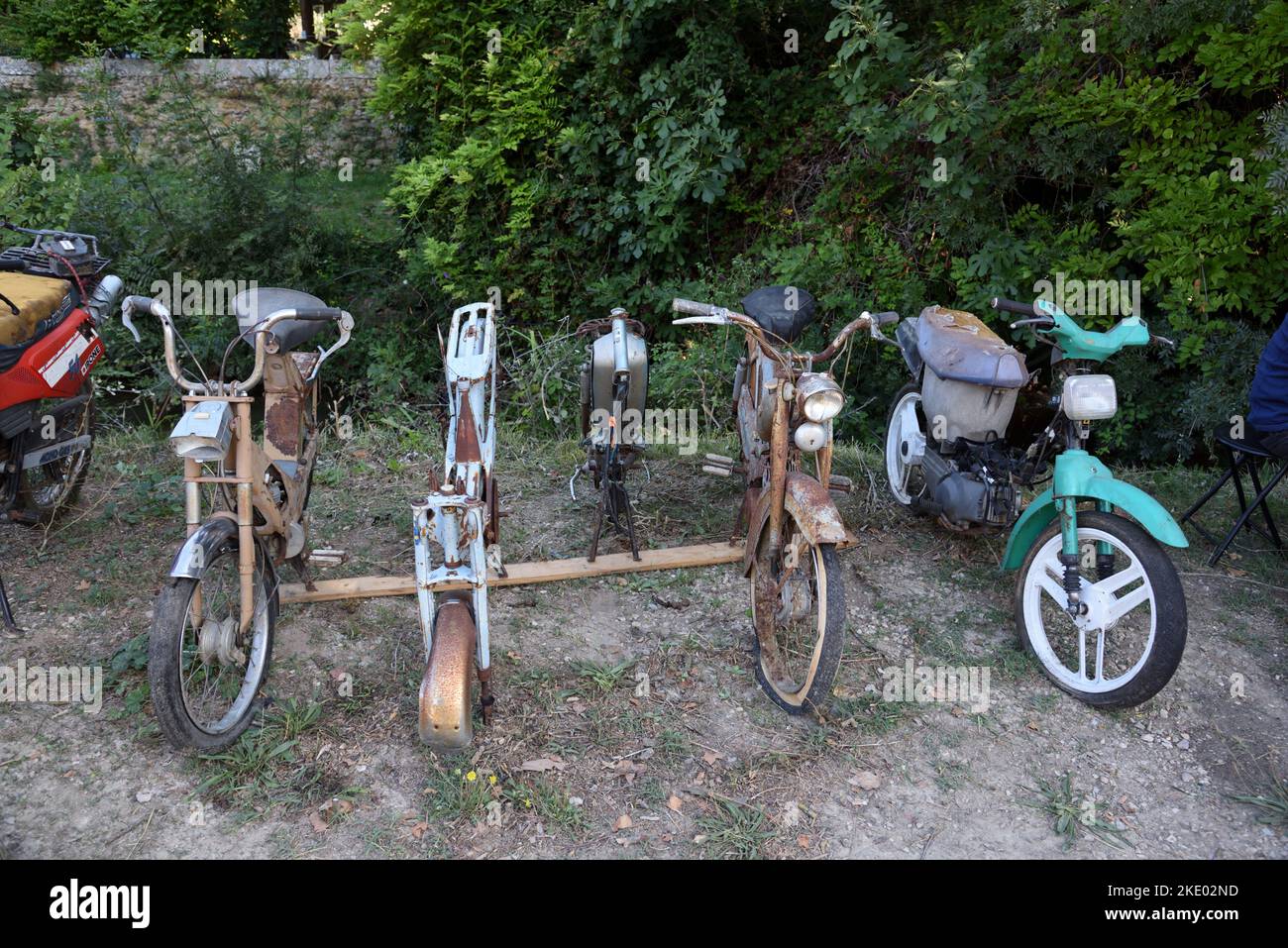 Wrecks of Rusty Old Motorcycles or Motorbikes for Sale for Restoration Project Stock Photo