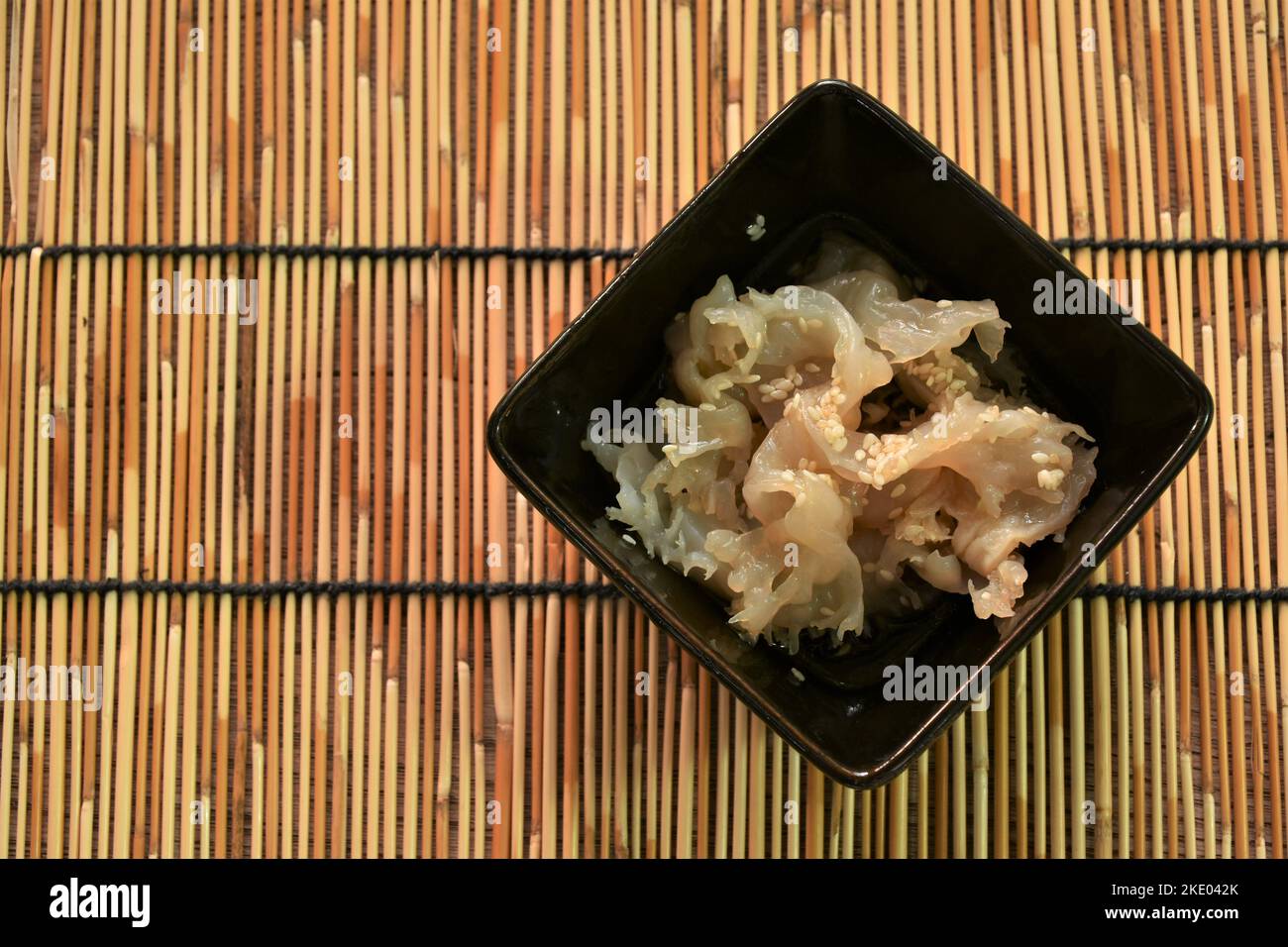 fermenting jellyfish in white sesame oil on bowl Stock Photo - Alamy