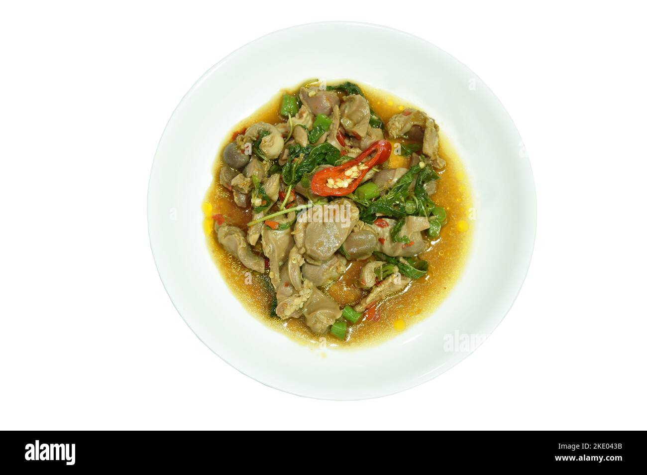 spicy stirfried chicken gizzard with yard long bean and chili on plate