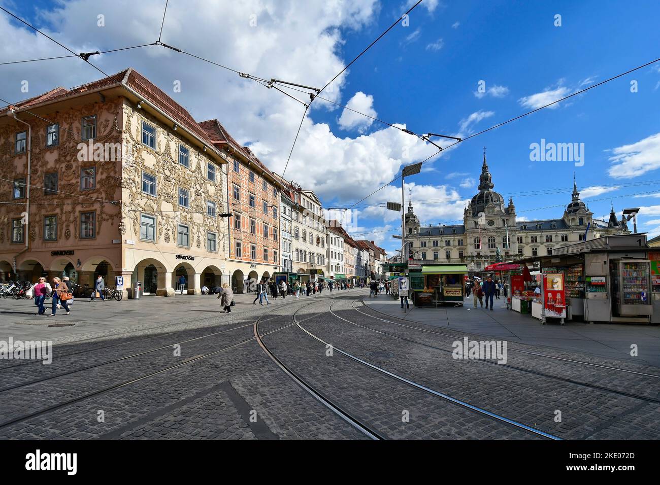 Graz, Austria - September 22, 2022: Unidentified people on main square with market and various stalls for drinks and food as well as the adjoining bar Stock Photo