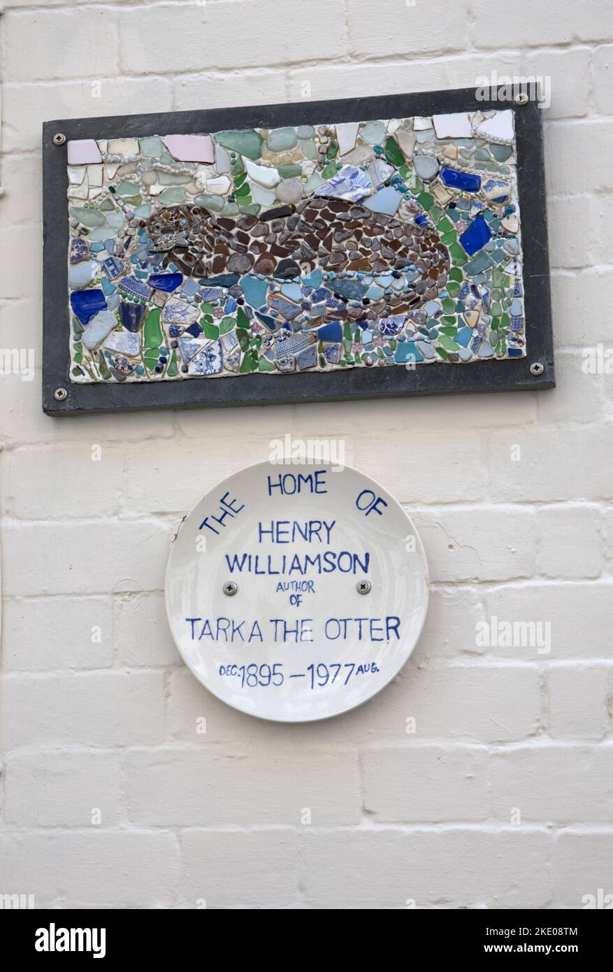 Mosaic and plaque marking the home of Henry Williamson author of Tarka the Otter Ilfracombe Stock Photo