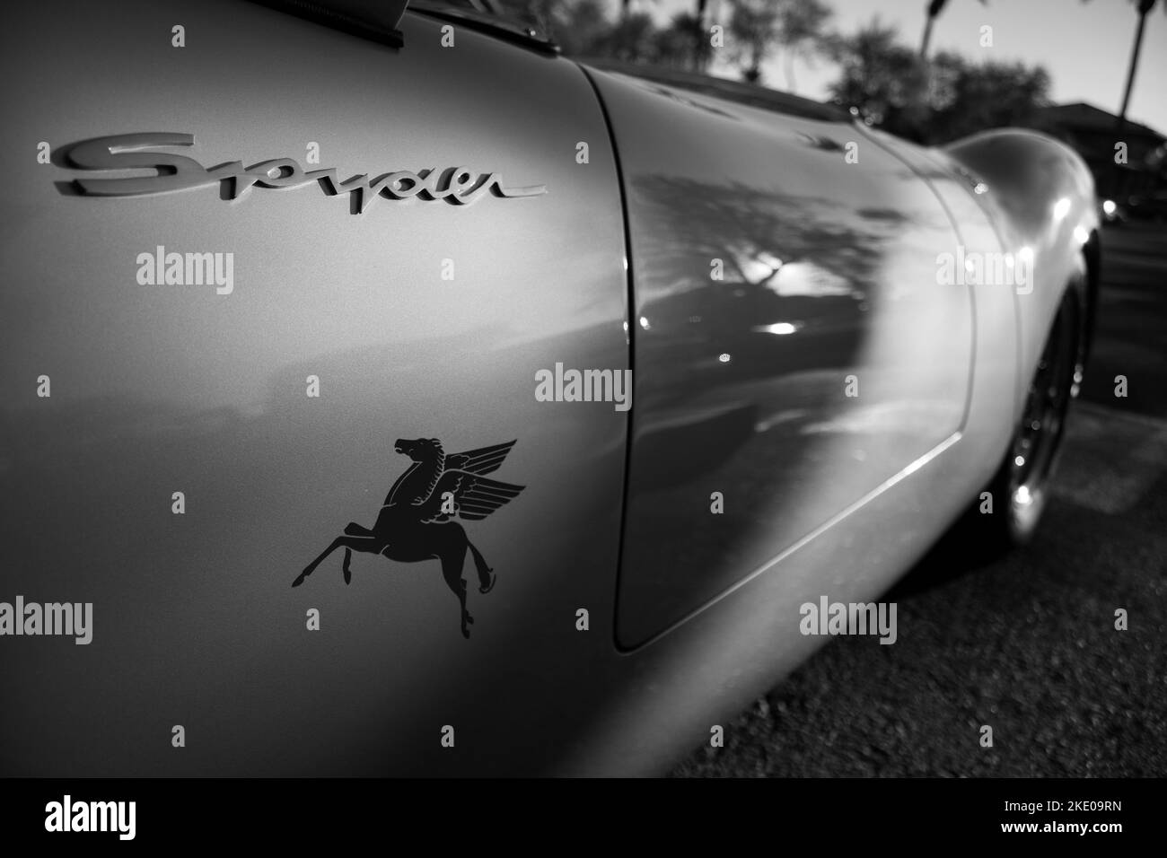 A closeup of gray porsche spyder car with horse sign Stock Photo Alamy