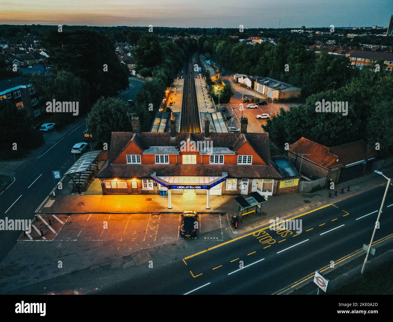 An aerial shot of TFL Croxley Green Tube Station at sunset in