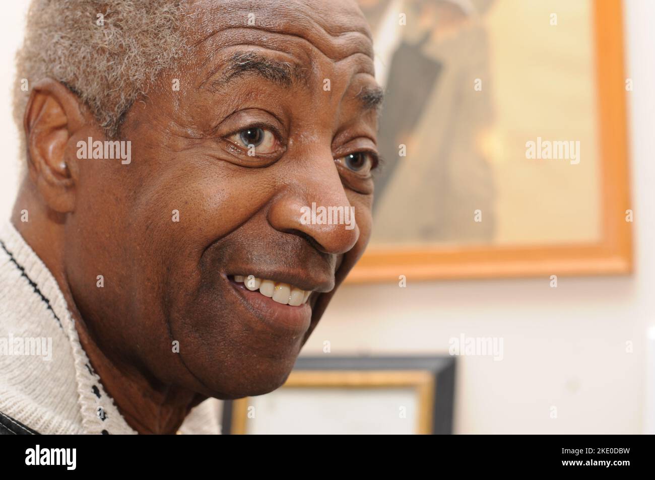 Front view portrait of an elderly black man with grey eyes Stock Photo ...
