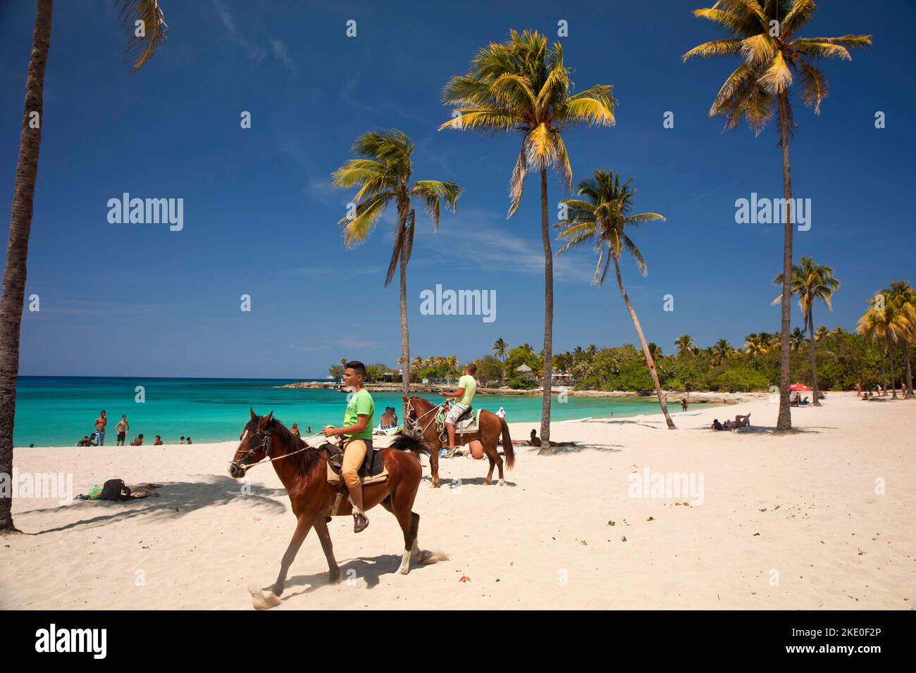 Pferde und Reiter am Strand von Bacuranao, Playas del este, Havanna, Kuba, Karibik  | horseriding at Bacuranao Beach, Playas del este,  Havana, Cuba, Stock Photo