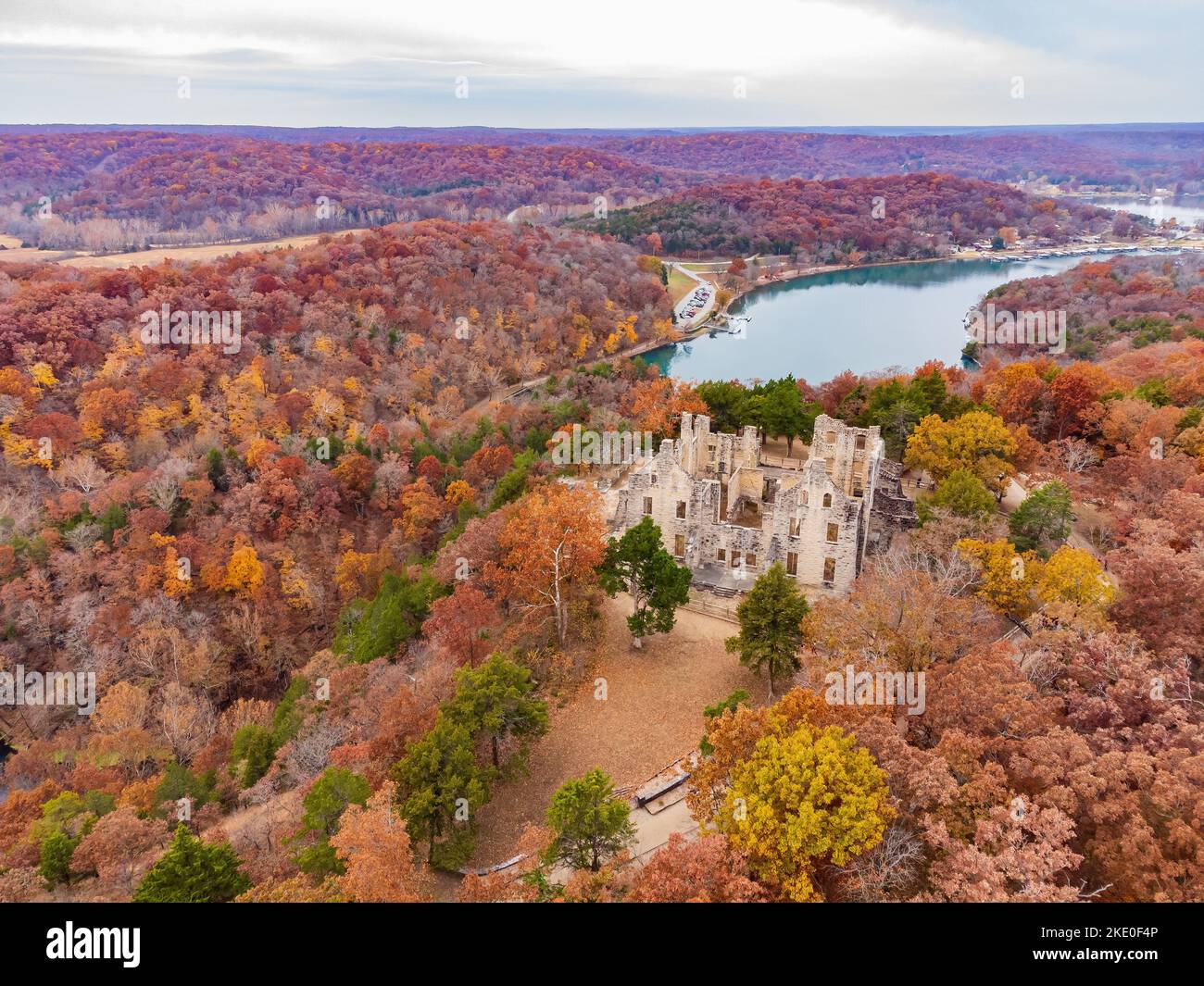 Aerial view of the fall color of Lake Ozark and the castle ruins at