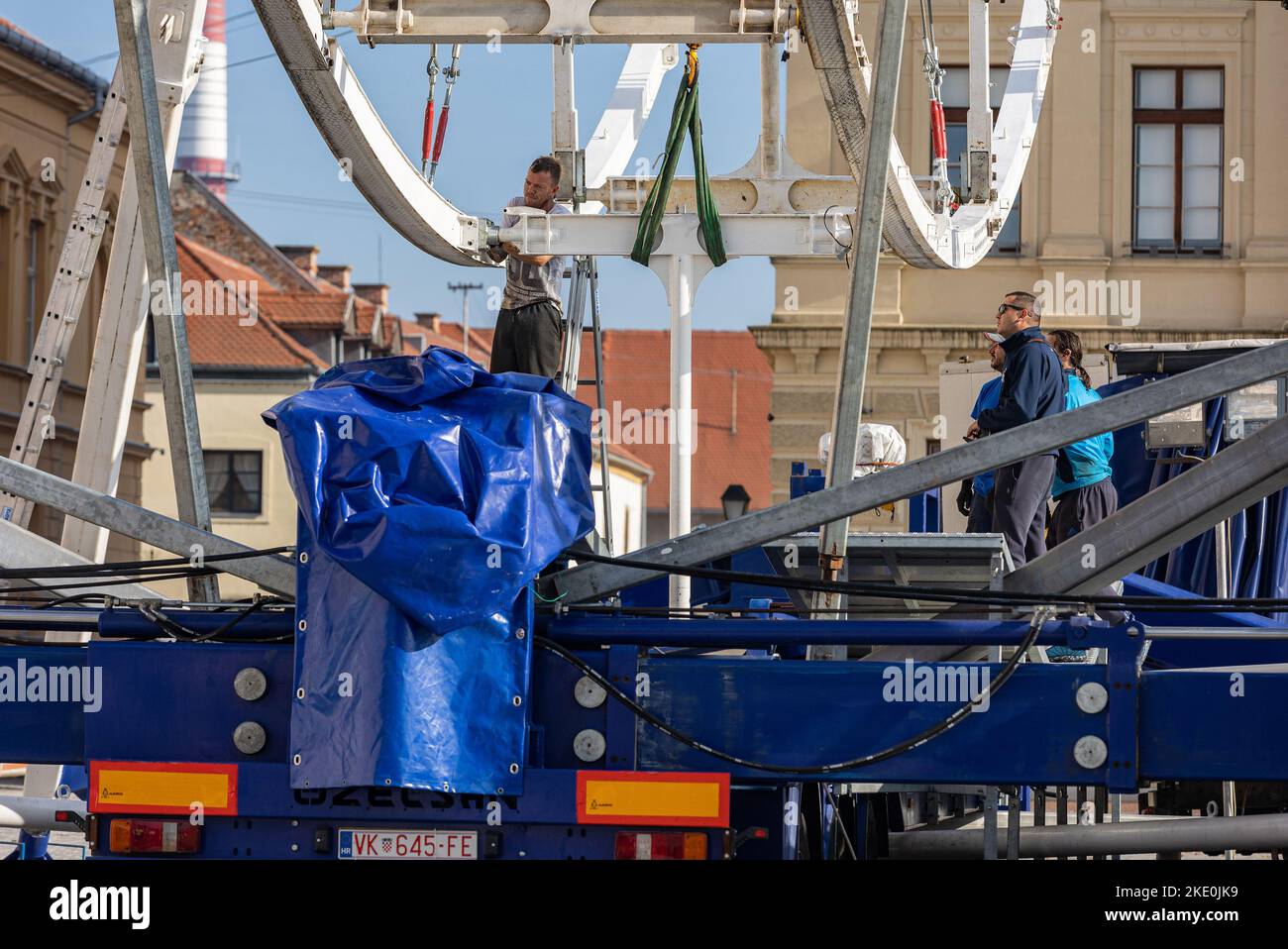Installation of the Ferris wheel on the Holy Trinity Square in Tvrđa in ...