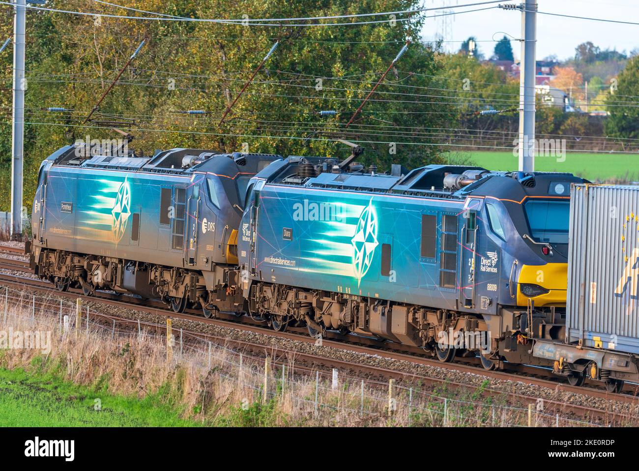 Twin class 88 electric freight locomotives named Prometheus ( left ) and Diana of Direct Rai Serices hauling fright at Winwick. Stock Photo
