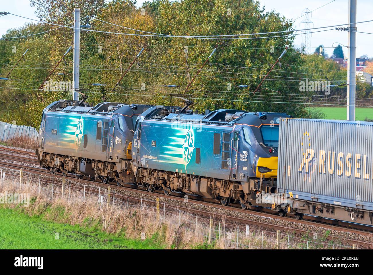Twin class 88 electric freight locomotives named Prometheus ( left ) and Diana of Direct Rai Serices hauling fright at Winwick. Stock Photo