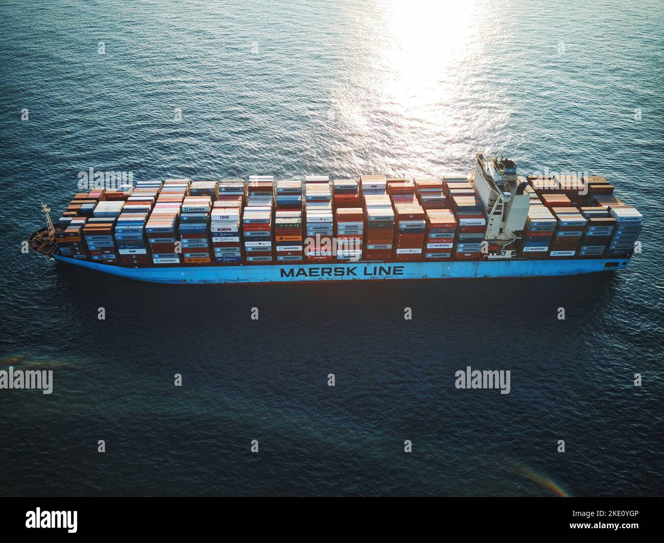 An aerial shot of a Maersk Line tanker in the ocean during sunset Stock Photo