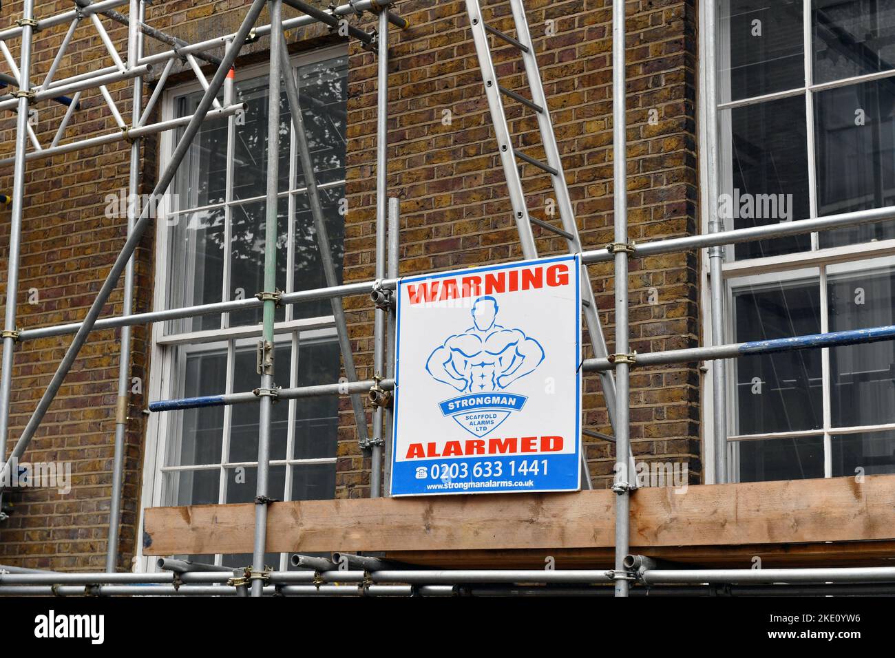 Scaffolding under alarm on a building in London - England Stock Photo